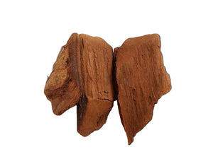 Three pieces of brown wood on a white background